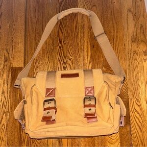 Stylish camel beige /w leather Camera  Backpack. Never used. Padded inserts
